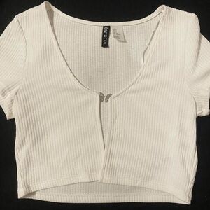 crop top with butterfly pendant